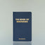 The Book of Reminders by Eric Bandholz against a grey background.
